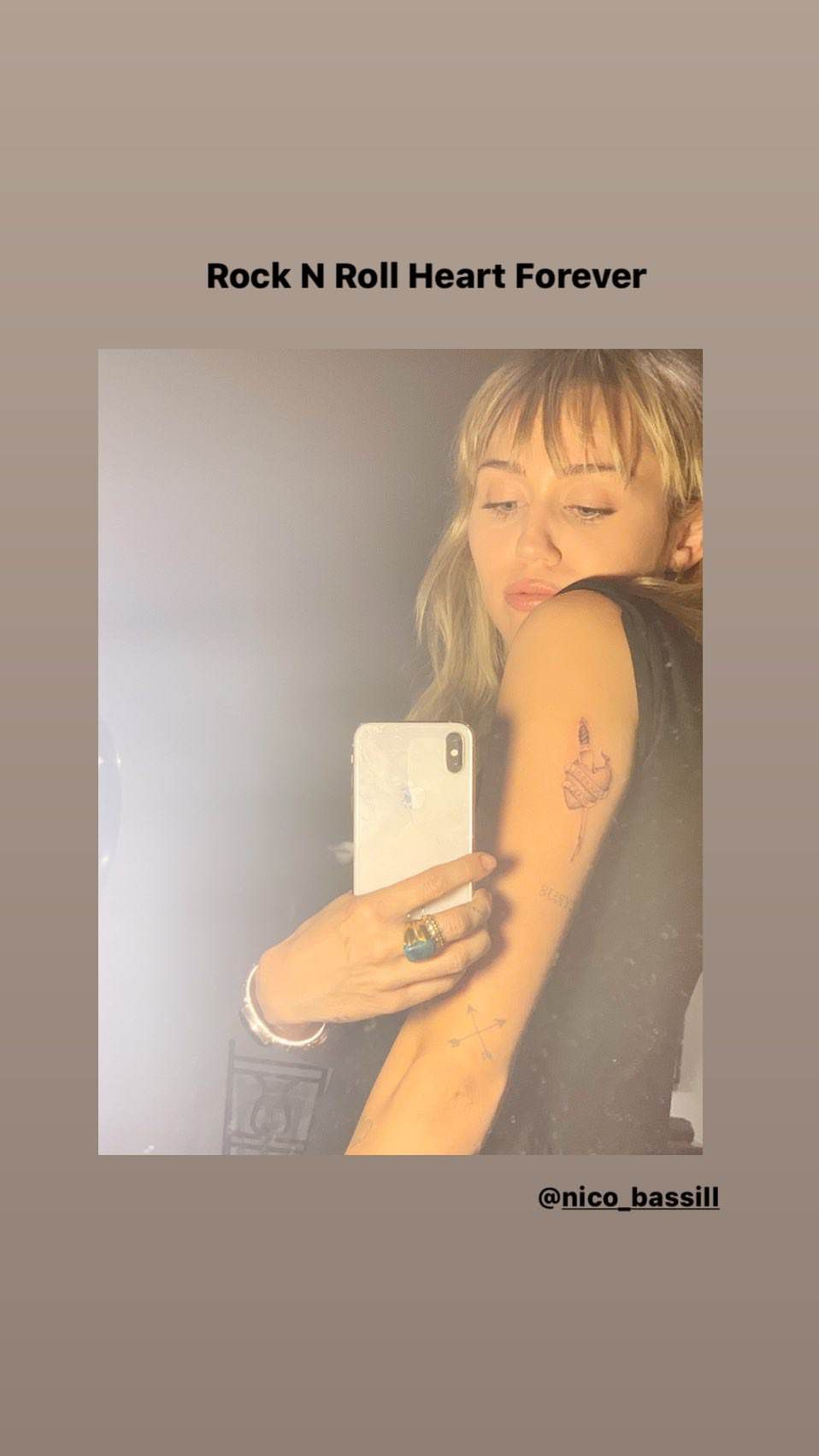 Miley Cyrus tatuaż
