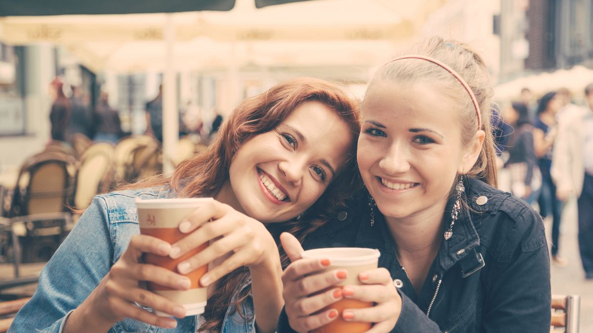 Teenage Girls Drinking at Bar