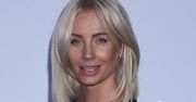Agnieszka Szulim w skromnej stylizacji na jesiennej ramówce TVN 2016. Czarna sukienka odsłoniła długie nogi gwiazdy