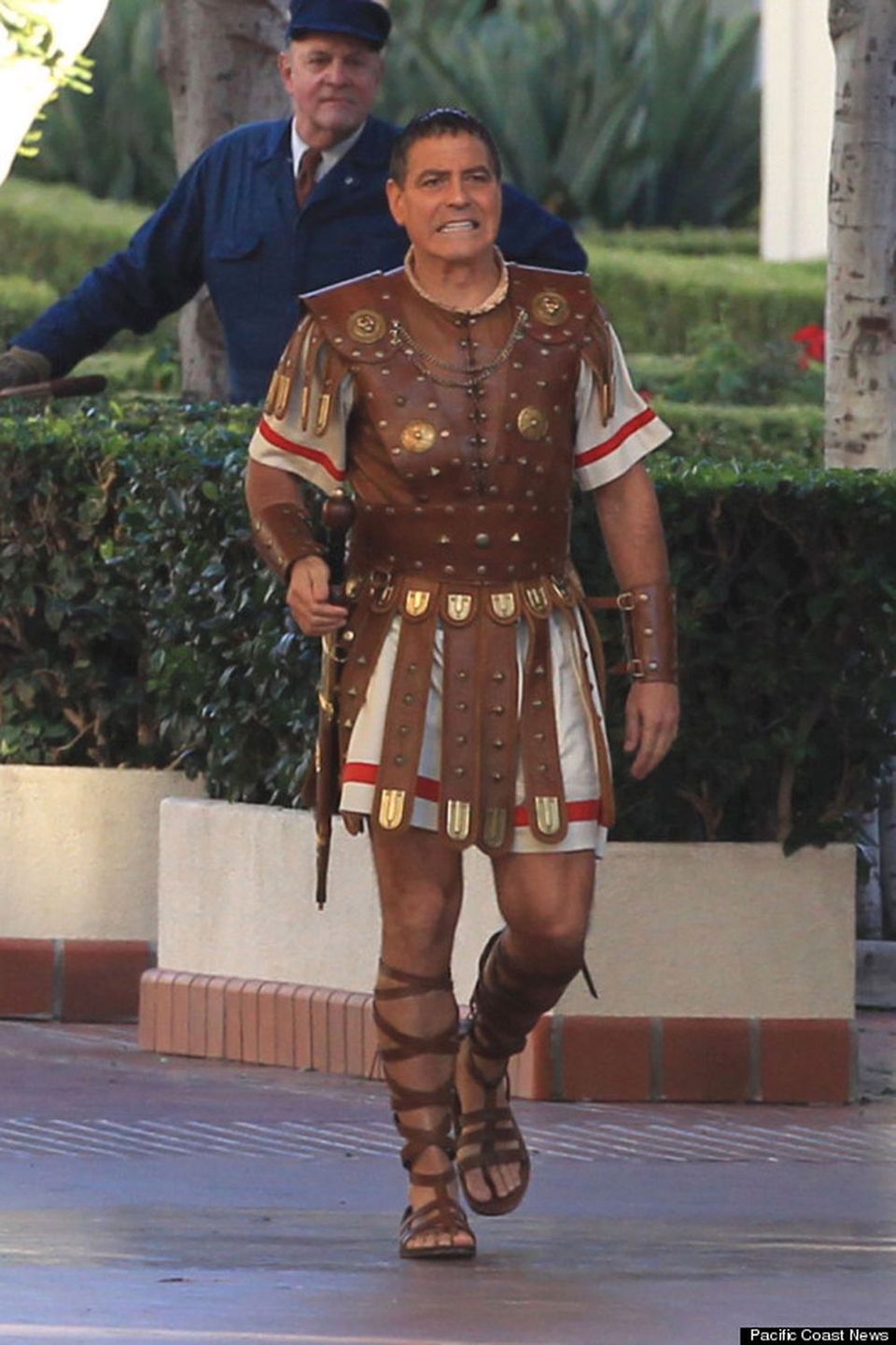 George Clooney dressed as a gladiator seen coming out of a taxi cab while filming scenes for the movie "Hail Caesar" at Union Station. Los Angeles, California - Thursday December 4, 2014. Photograph: Miguel Aguilar/Sam Sharma, © PacificCoastNews. Los Angeles Office: +1 310.822.0419 sales@pacificcoastnews.com FEE MUST BE AGREED PRIOR TO USAGE