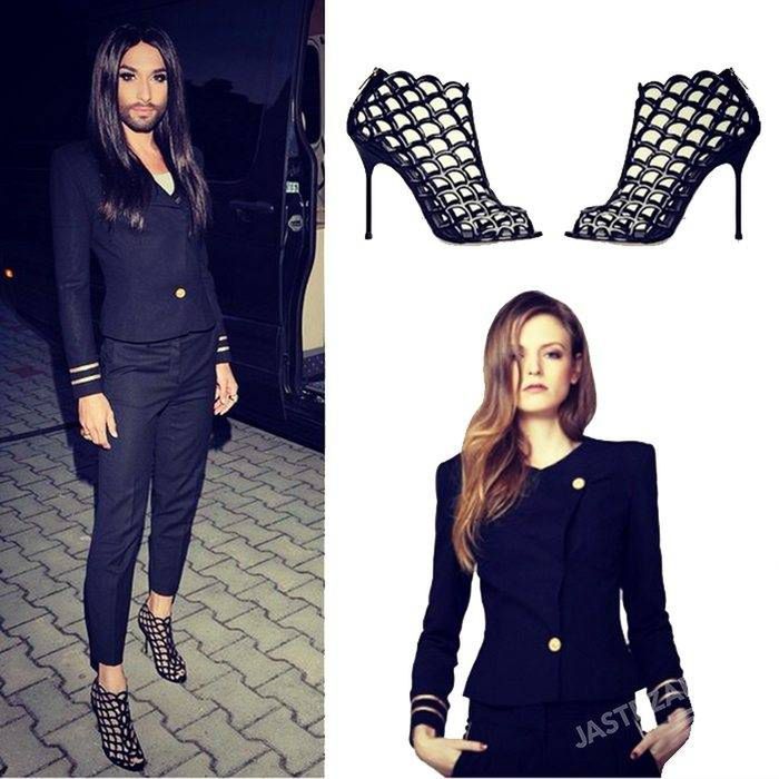 Conchita Wurst na Sabacie Czarownic 2015 w butach Sergio Rossi i garniturze Plakinger