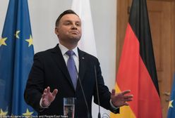 Andrzej Duda w Berlinie. Tłumaczy zależność między żarówką energooszczędną a demokracją