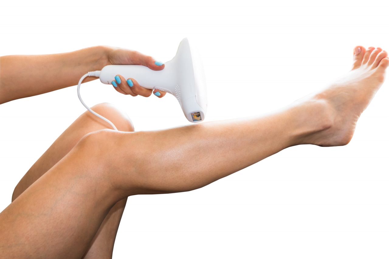 photo epilation on womans leg - clipping path 