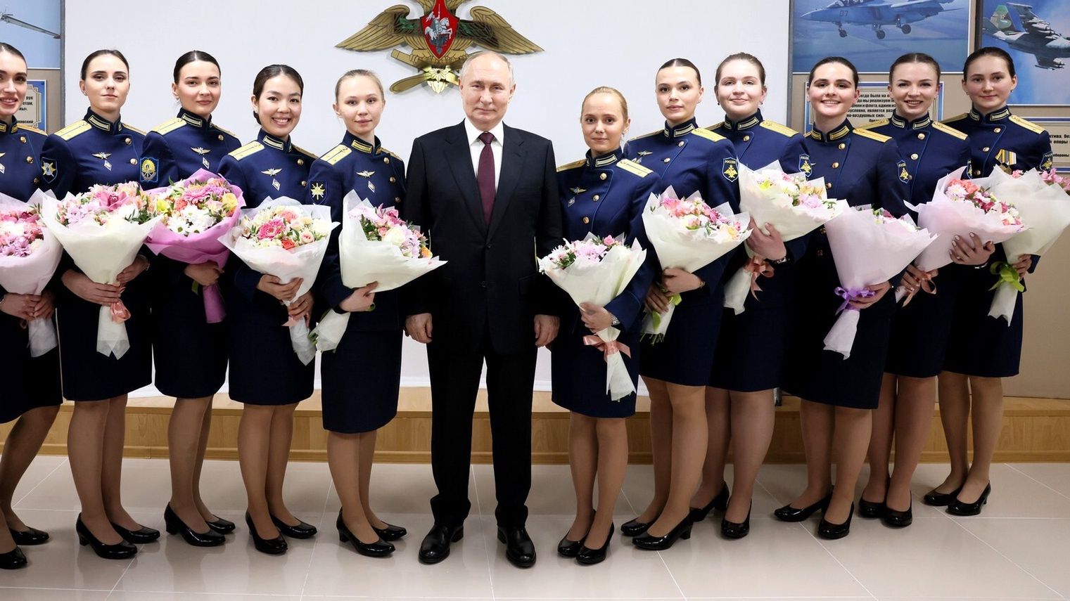 Russian President Putin on working trip to Krasnodar RegionMOSCOW, RUSSIA - MARCH 7: (----EDITORIAL USE ONLY - MANDATORY CREDIT - 'KREMLIN PRESS OFFICE / HANDOUT' - NO MARKETING NO ADVERTISING CAMPAIGNS - DISTRIBUTED AS A SERVICE TO CLIENTS----) Russia's President Vladimir Putin meets with graduates at Krasnodar Higher Military Aviation School of Pilots in Krasnodar, Russia on March 7, 2024. (Photo by Kremlin Press Office / Handout/Anadolu via Getty Images)Anadoluaviation, capital, graduates, meet, moscow, pilots, plane, russia's president vladimir putin, school, students, work trip