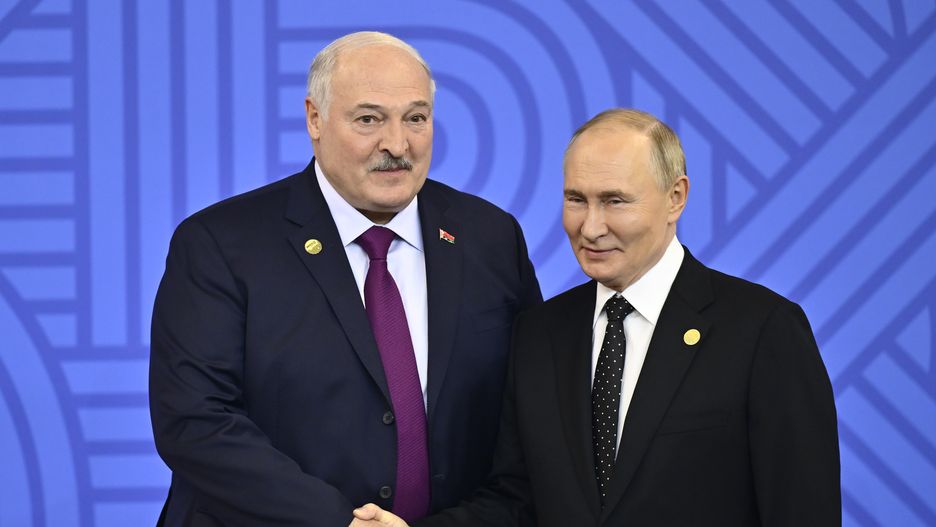 KAZAN, RUSSIA - OCTOBER 23: Russian President Vladimir Putin (R) greets Belarus President Alexander Lukashenko during an official welcoming ceremony for delegations' heads at the BRICS 2024 Summit in Kazan, Russia, 23 October 2024. (Photo by Sefa Karacan/Anadolu via Getty Images)