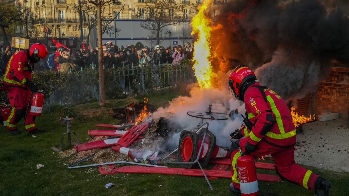 Firefighters in Place d'Italie during a demonstration against pension reform in central Paris, France, on Thursday, April 6, 2023. French unions are leading another round of strikes and protests against President Emmanuel Macron's pension reform, capitalizing on broad public support for a movement that has caused trash to pile up on the streets of Paris and sporadically turned violent. Photographer: Nathan Laine/Bloomberg via Getty Images