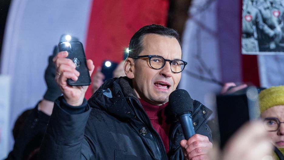 Mateusz Morawiecki is taking part in the Anti-government 'Free Poles Protest' where demonstrators are marching in front of the Polish Parliament building in Warsaw, Poland, on January 11, 2024. They are protesting against the new Civic Platform party government, the change of the board of directors in public media, and the arrest of former Law and Justice party politicians Mariusz Kaminski and Michal Wasik. (Photo by Andrzej Iwanczuk/NurPhoto via Getty Images)