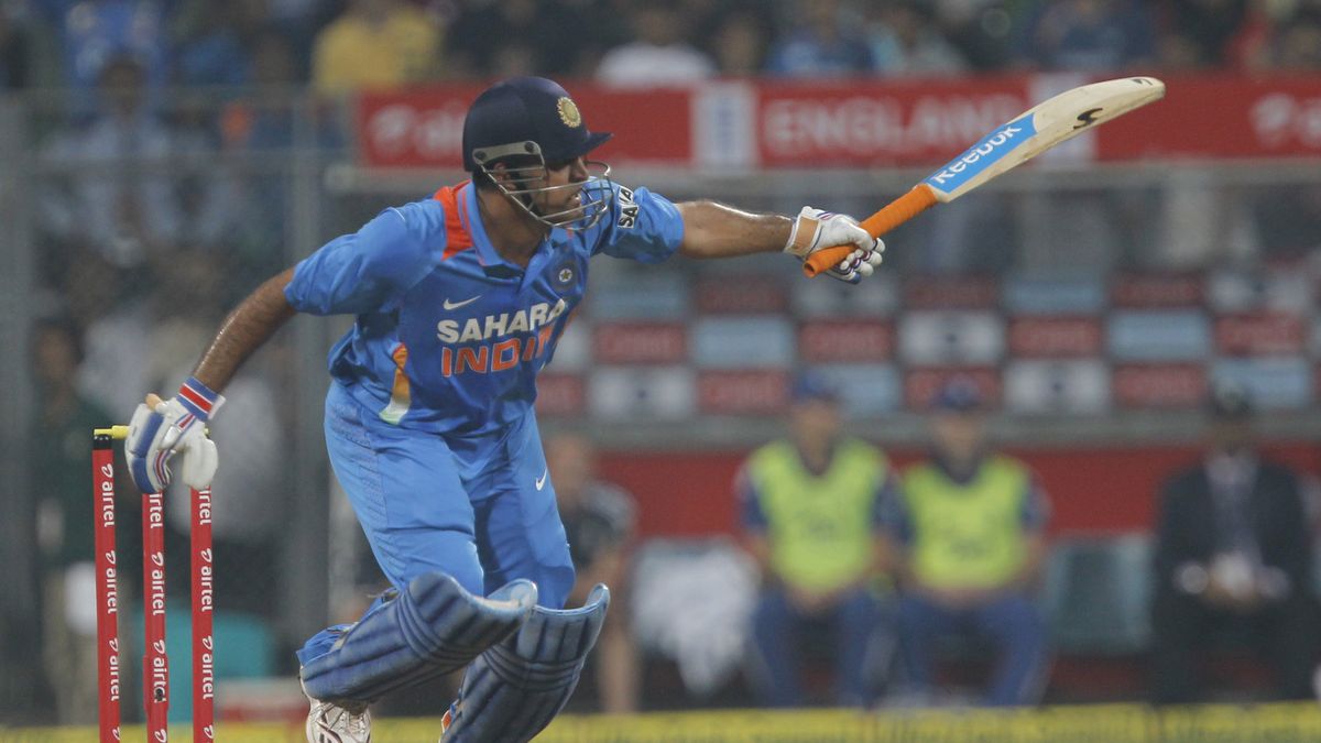 MUMBAI, INDIA - DECEMBER 22, 2012: India's captain Mahendra Singh Dhoni in action  during a T20 cricket match between India and England at Wankhede Stadium, on December 22, 2012 in Mumbai, India. (Photo by Satish Bate/Hindustan Times via Getty Images)