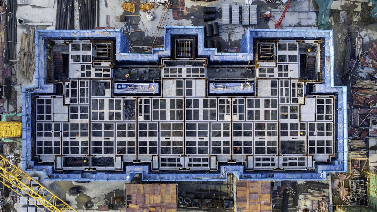 Workers are working at the real estate construction site of a resettlement housing project along the Beijing-Hangzhou Grand Canal in Huai'an, China, on March 2, 2024. Recently, Nanjing and Suzhou announced the liberalization of third home loans. (Photo by Costfoto/NurPhoto via Getty Images)