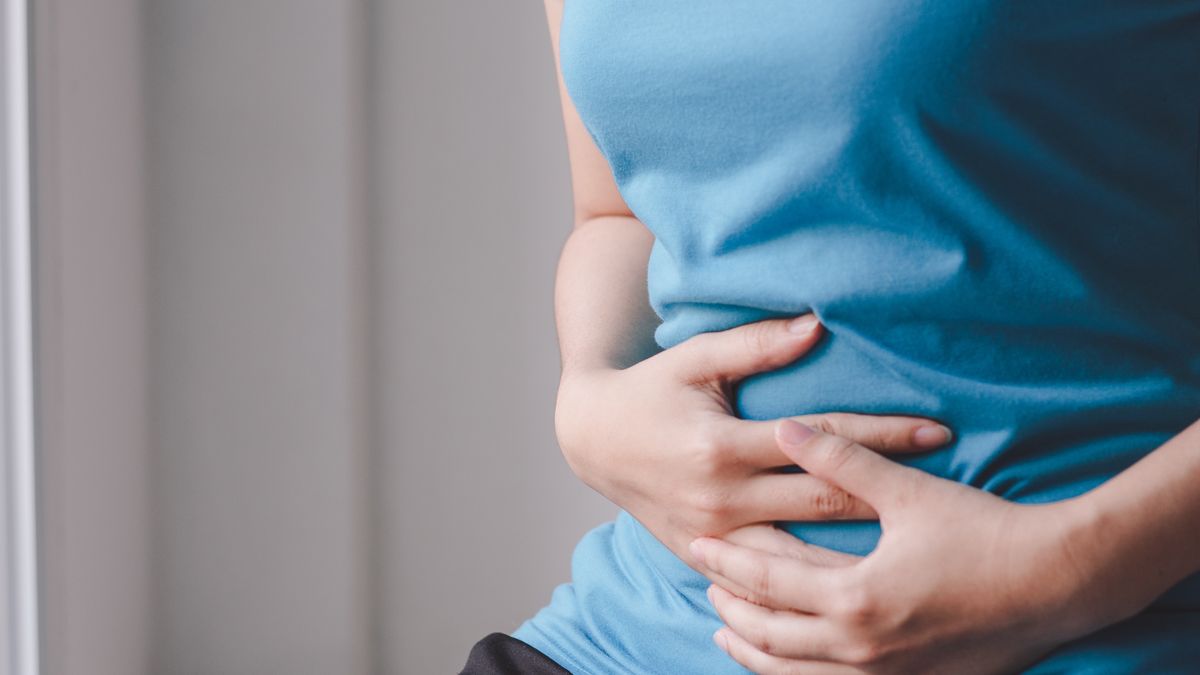 Midsection Of Woman With Stomachache Sitting At Home
Wacharaphorn Phetpradub / EyeEm
suffering