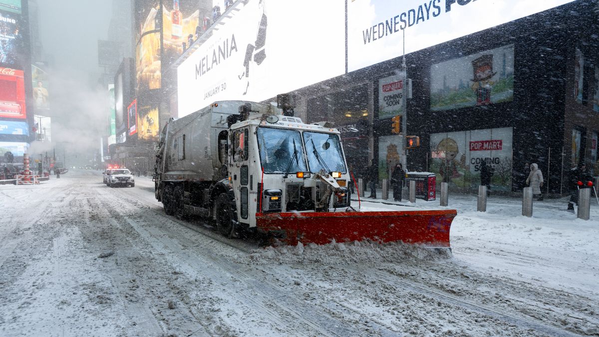 NEW YORK, NEW YORK - JANUARY 25: Trucks plow through the snow in Times Square on January 25, 2026 in New York City. (Photo by Craig T Fruchtman/Getty Images)
