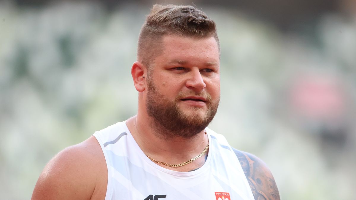 TOKYO, JAPAN - AUGUST 02: Pawel Fajdek of Team Poland looks on during the Men's Hammer Throw Qualification on day ten of the Tokyo 2020 Olympic Games at Olympic Stadium on August 02, 2021 in Tokyo, Japan. (Photo by Abbie Parr/Getty Images)