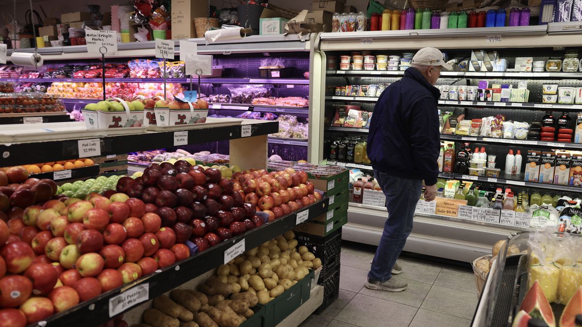 TORONTO, ONTARIO - FEBRUARY 03: A consumer shops in a grocery store on February 03, 2025 in Toronto, Ontario. People in Canada are facing the prospect of higher grocery prices due to the trade war that U.S. President Donald Trump initiated. Canada announced retaliatory tariffs and product embargos after Trump announced 25 percent tariffs on Canadian goods. (Photo by Joe Raedle/Getty Images)