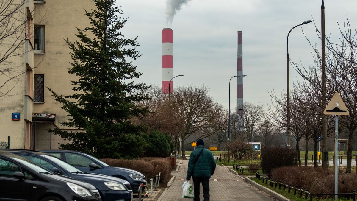 A pedestrian in a residential area near the Siekierki thermal power plant, operated by PGNiG Termika SA, in Warsaw, Poland, on Tuesday, Dec. 24, 2024. Poland is becoming increasingly prone to power shortages later this decade after gas-fed power units planned by the utilities failed to win any support at a key market auction. Photographer: Damian Lemanski/Bloomberg via Getty Images