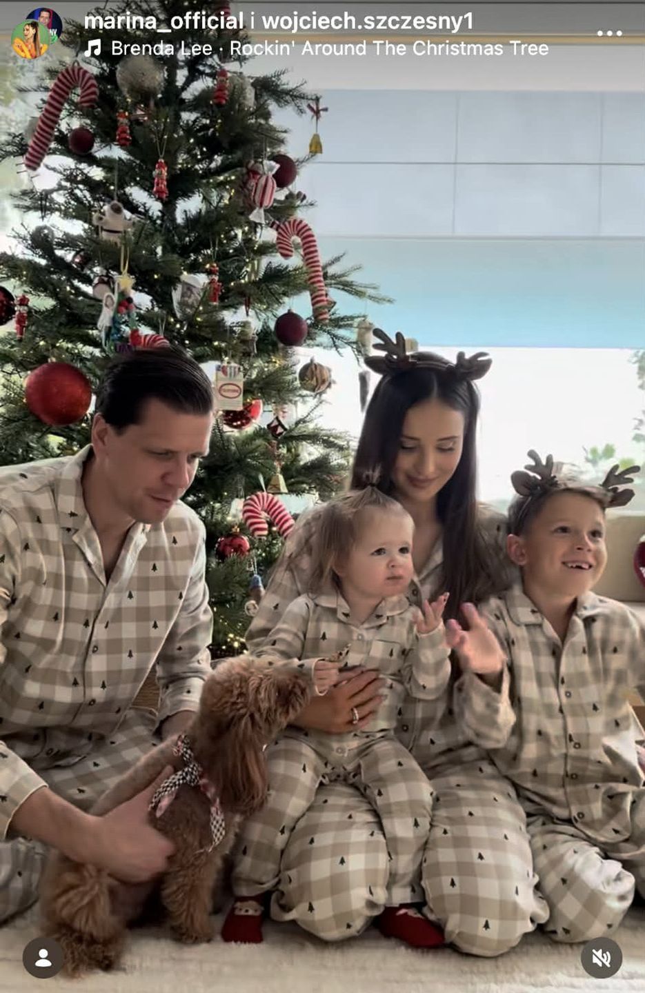 Marina Łuczenko i Wojciech Szczęsny z dziećmi