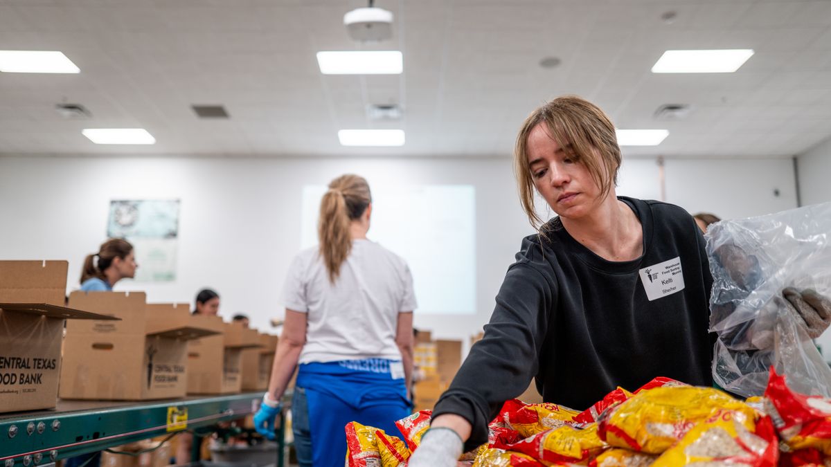 AUSTIN, TEXAS - MARCH 26: Volunteers organize and package food at the Central Texas Food Bank on March 26, 2025 in Austin, Texas. The Texas Central Food Bank, covering over 21 counties and regularly providing food for more than 530,000 food insecure families, has had roughly 40 deliveries canceled within the last two weeks through the USDA's partnering network CCC (Commodity Credit Corporation). The canceled deliveries amounted to over 912,000 pounds of product, including essential pantry items such as vegetables, chicken, turkey, pork, cheese, and milk.  (Photo by Brandon Bell/Getty Images)