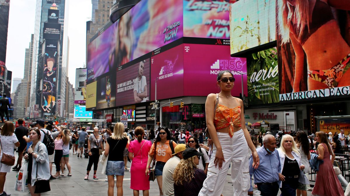 New York Summer Tourism Season is in Full SwingNEW YORK, NEW YORK - JULY 17: A tourist waits for a picture at Times Square, on July 17, 2022 in New York. The summer tourism season is in full swing across New York  despite inflation and gas prices. (Photo by John Smith/VIEWpress)VIEW press