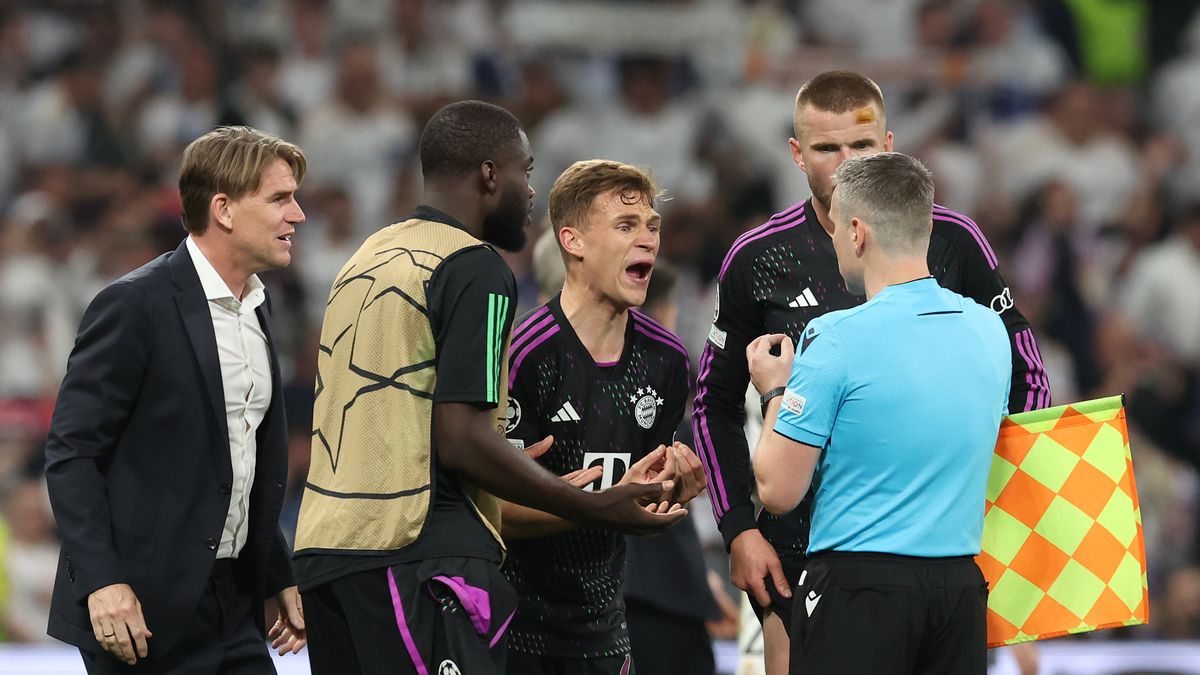 MADRID, SPAIN - MAY 08: Joshua Kimmich of FC Bayern München talks to the Linesman after the UEFA Champions League semi-final second leg match between Real Madrid and FC Bayern München at Estadio Santiago Bernabeu on May 08, 2024 in Madrid, Spain. (Photo by Alexander Hassenstein/Getty Images)
