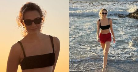 Zgrabna Małgorzata Socha w topie ucieka przed mewami, pozdrawiając fanów znad oceanu
