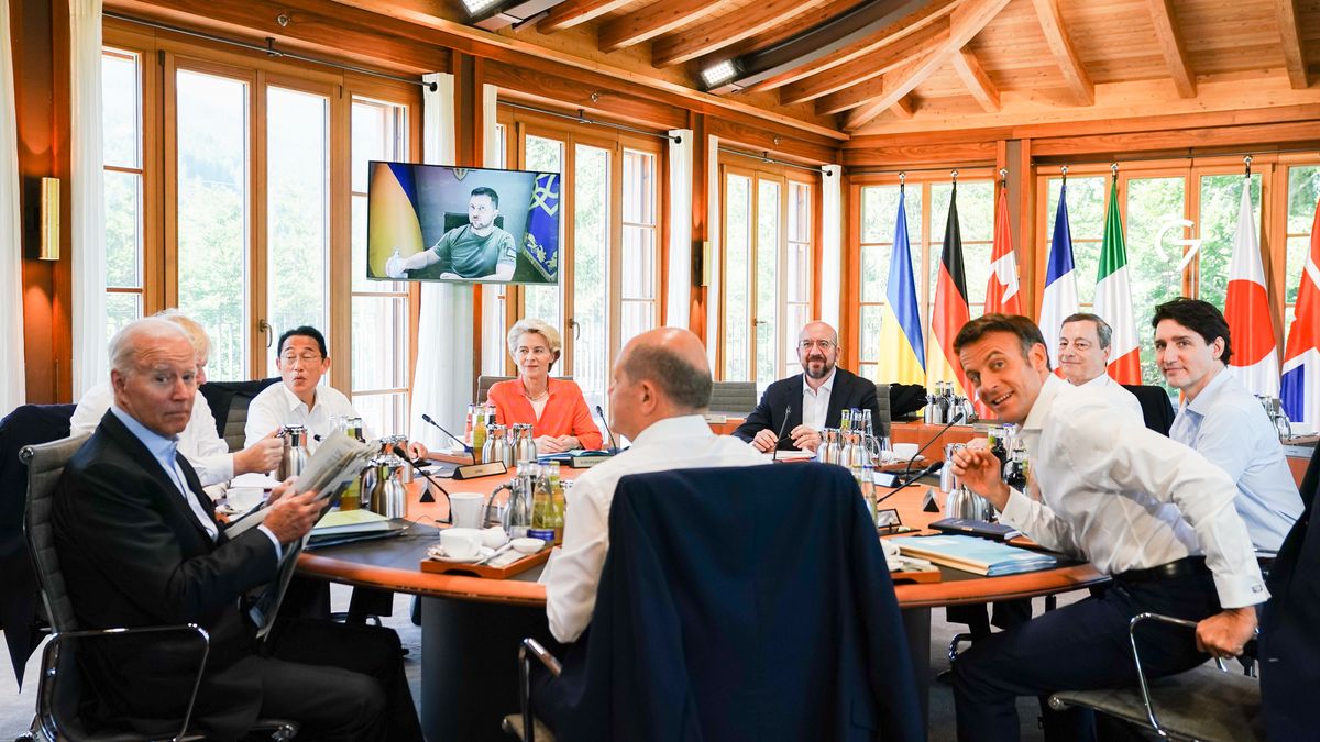 GARMISCH-PARTENKIRCHEN, GERMANY - JUNE 27: Ukrainian President Volodymyr Zelensky gives a speech via video link to G7 leaders (L-R) US President Joe Biden, Japanese Prime Minister Fumio Kishida, European Commission President Ursula von der Leyen, German Chancellor Olaf Scholz, European Council President Charles Michel, French President Emmanuel Macron, Italian Prime Minister Mario Draghi, Canadian Prime Minister Justin Trudeau on the second day of the three-day G7 summit at Schloss Elmau on June 27, 2022 near Garmisch-Partenkirchen, Germany. Leaders of the G7 group of nations are officially coming together under the motto: "progress towards an equitable world" and will discuss global issues including war, climate change, hunger, poverty and health. Overshadowing this year’s summit is the ongoing Russian war in Ukraine. (Photo by Christinan Bruna - Pool/Getty Images)