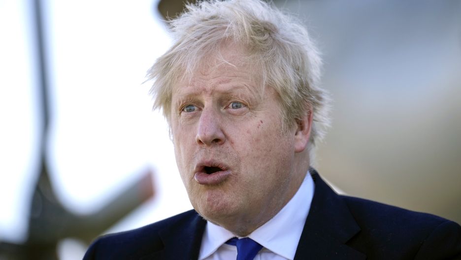 DOVER, ENGLAND - APRIL 14: Prime Minister Boris Johnson meets crews and technical staff at Lydd Airport on April 14, 2022 in Dover, England. The UK government announced that they will process people seeking asylum in Britain 4,500 miles away in Rwanda in an effort to crack down on unauthorised migration. (Photo by Matt Dunham - WPA Pool/Getty Images)