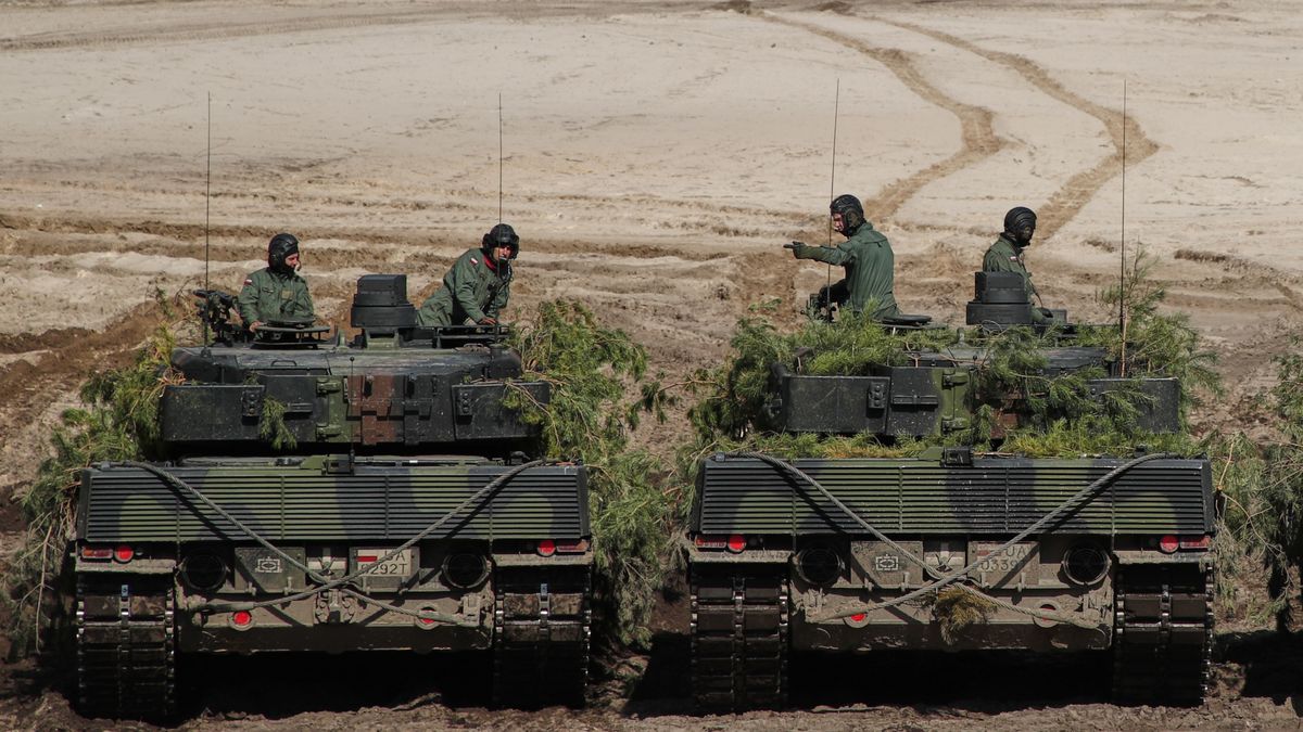 German made Leopard 2 tanks of the Polish army are seen lined up after a joint exercise with the US army at the 21st Rifle Regiment training groun in Nowa Deba, Poland on April 8, 2022. The exercise training was the first of its kind shown to the press and is meant to fortify Poland's military position after the invasion of Ukraine by Russia. (Photo by STR/NurPhoto via Getty Images)