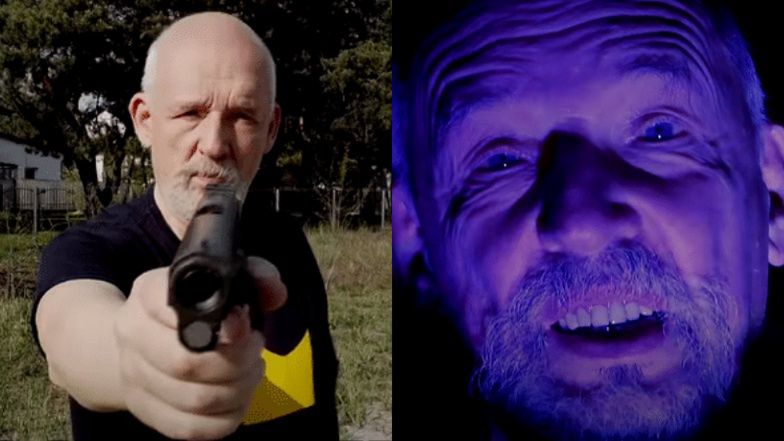 Odklejony od rzeczywistości Janusz Korwin-Mikke strzela z broni i "rapuje" w Hot 16 Challenge (WIDEO)