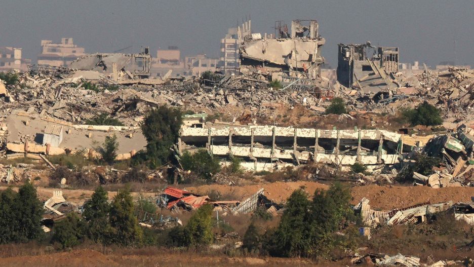 This picture taken from a position at Israel&#39;s border with the Gaza Strip shows destroyed buildings in the besieged Palestinian territory on September 17, 2025. Israel launched its ground assault on Gaza City before dawn on September 16, shortly after the US Secretary of State&#39;s visit expressing robust support for the offensive, while a United Nations probe charged Israel with committing &#34;genocide&#34; in the Palestinian territory and accused its Prime Minister and other top officials of incitement. (Photo by Jack GUEZ / AFP)