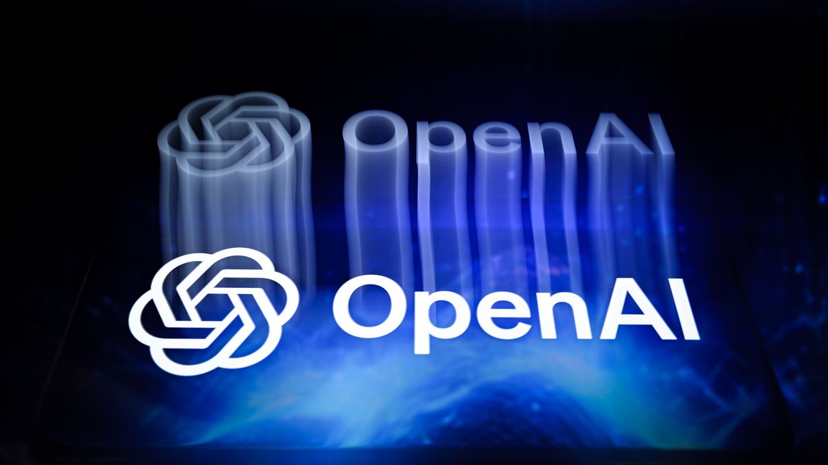 The OpenAI logo is displayed on a smartphone screen placed on a reflective surface with a blue abstract illustration projected onto it, photographed with an artistic motion blur effect achieved through double exposure, in Creteil, France, on June 9, 2026. OpenAI confirms it has confidentially filed a prospectus for an initial public offering (IPO) with the Securities and Exchange Commission (SEC). (Photo by Samuel Boivin/NurPhoto via Getty Images)