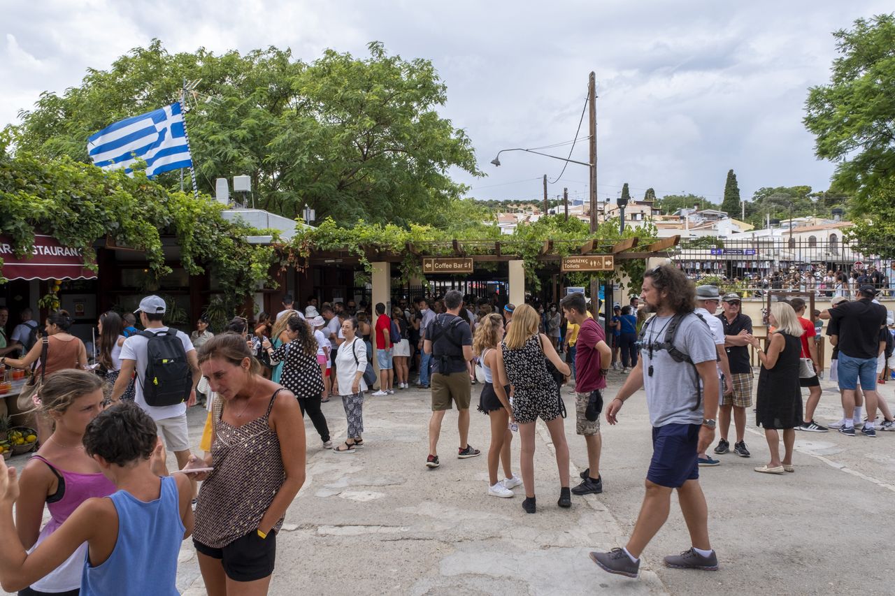 Tourists exploring the archaeological site of Knossos
(photo by Andrew Aitchison / In pictures via Getty Images)