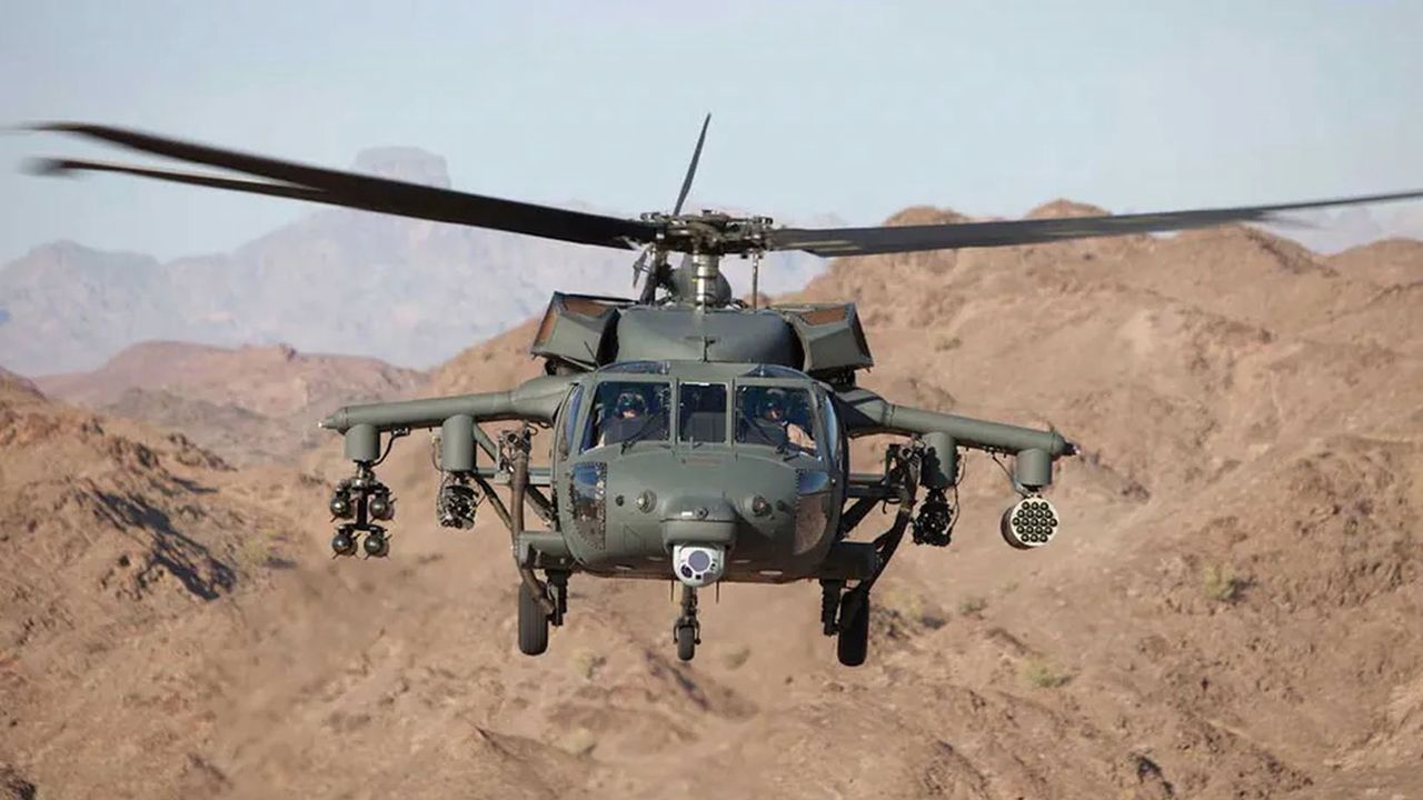 A Black Hawk helicopter with visible armament