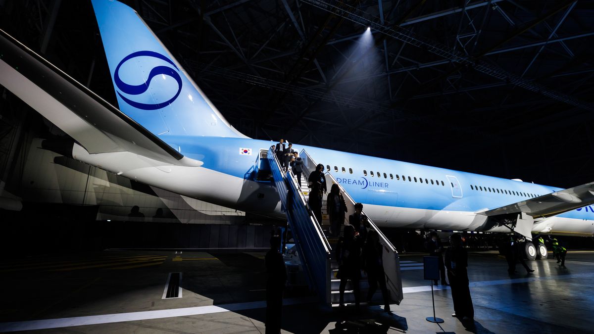 A Boeing Co. 787-10 Dreamliner aircraft in new Korean Air Lines Co Ltd. livery at Gimpo International Airport in Seoul, South Korea, on Tuesday, March 11, 2025. Korean Air unveiled a new corporate logo and aircraft livery as part of a wide-ranging brand refresh following its acquisition of local rival Asiana Airlines Inc. that has created Asias second-biggest airline group. Photographer: SeongJoon Cho/Bloomberg via Getty Images