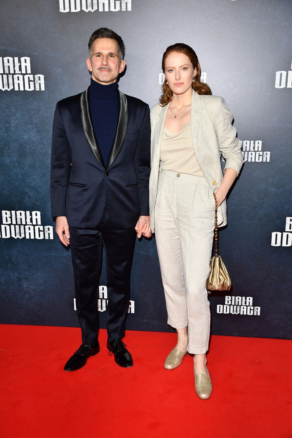 Marcin Bosak z partnerką na premierze filmu "Biała odwaga"