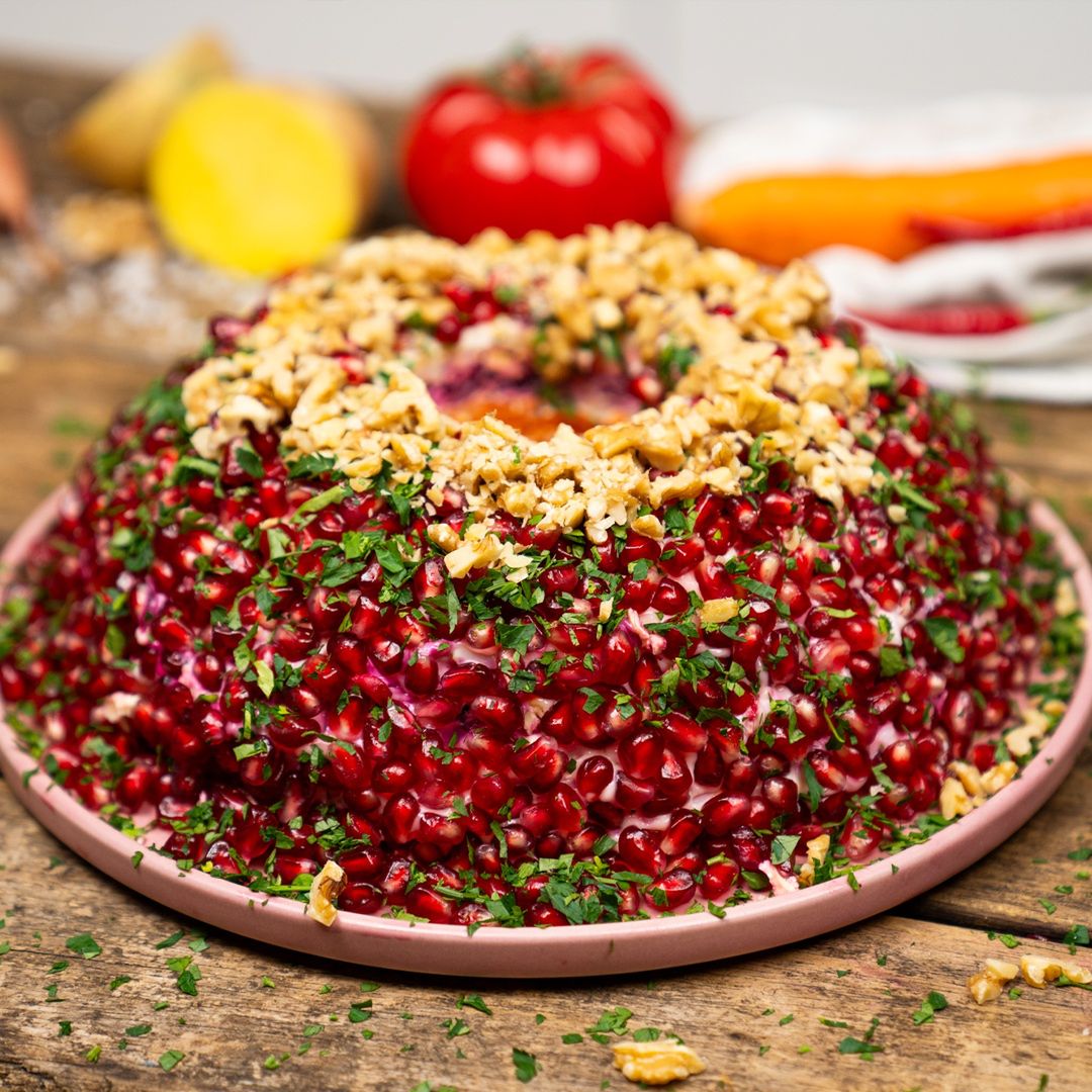 Layered salad with pomegranate