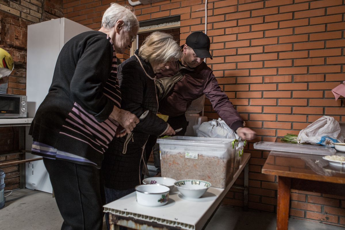 DNIPRO, UKRAINE - APRIL 11: Civilians fleeing from conflict zones in Donetsk and Luhansk oblasts, take shelter at Semeinuy Hostel as its owner opened his hostel's doors to Ukrainian refugees in Dnipro, Ukraine on April 11, 2022. Currently, 87 refugees are guests of the unfinished hostel, Semeinuy. From the first days of March more than 1000 people have found refuge in this structure. (Photo by Andrea Carrubba/Anadolu Agency via Getty Images)