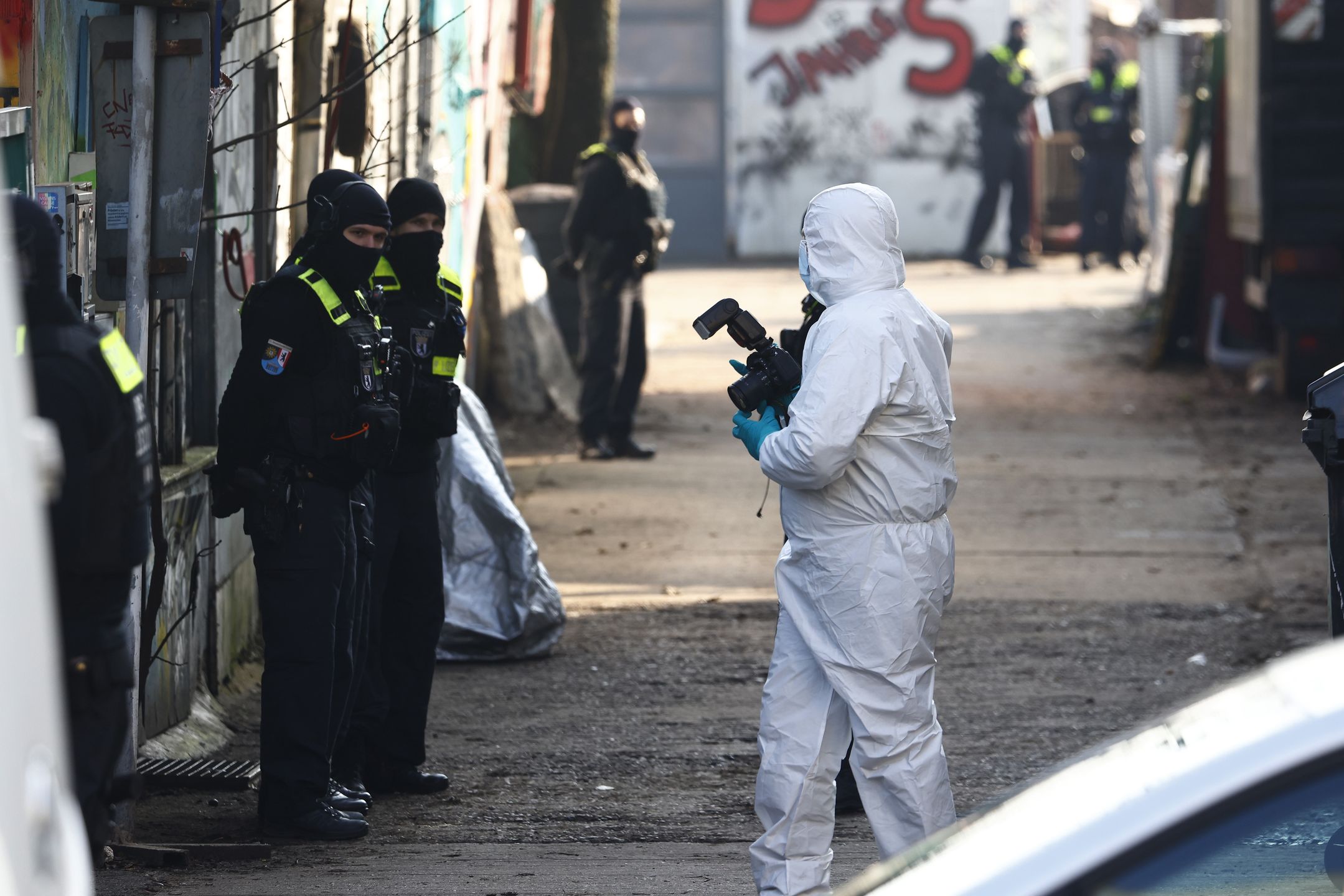 BERLIN, GERMANY - MARCH 3: Police attend near a commercial property in Friedrichshain district where they were seeking RAF terror group members Ernst-Volker Staub and Burkhard Garweg on March 3, 2024 in Berlin, Germany. The hunt by law enforcement for the two men has intensified since the recent arrest of a third member of the group, Daniela Klette, in Berlin. The three were among the so-called "third generation" of the Red Army Faction, a leftist terror group that was responsible for politically motivated murders, kidnappings and attacks in the 1980s and 90s, but also supermarket and money transport robberies in the 2000s. (Photo by Michele Tantussi/Getty Images)