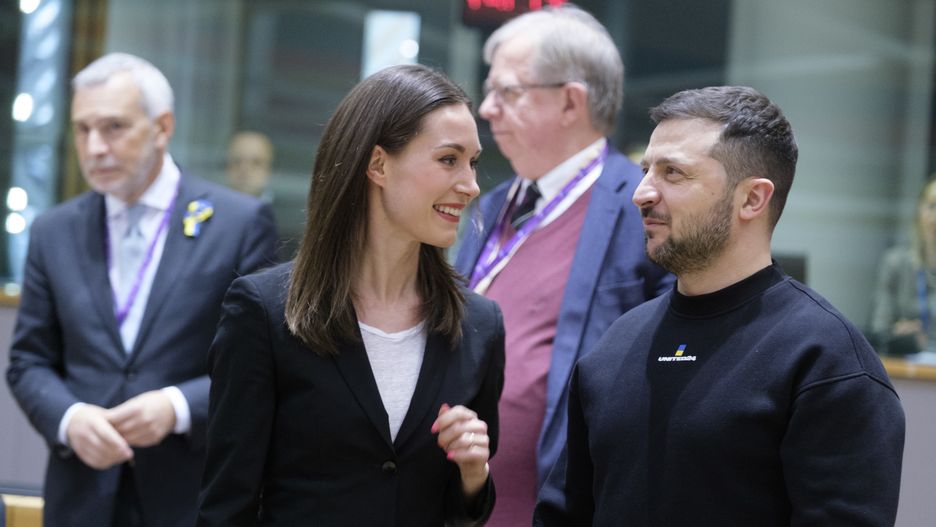 BRUSSELS, BELGIUM - FEBRUARY 9: Finish Prime Minister Sanna Mirella Marin (L) is talking with the President of Ukraine Volodymyr Zelenskyy (R) prior the start of an European Union leaders summit at the European Council headquarters on February 9, 2023 in Brussels, Belgium. President of Ukraine Volodymyr Zelensky began a surprise mini-European tour on February 8, his second trip abroad since the outbreak of the war on February 24, 2022 after his visit to the United States in December. The Ukrainian president is due to meet European Council President Charles Michel on February 9, pleading to his allies to deliver combat planes to Ukraine "as soon as possible", Volodymyr Zelenskyy is expected at the Brussels summit after his visits to London and Paris. (Photo by Thierry Monasse/Getty Images)
