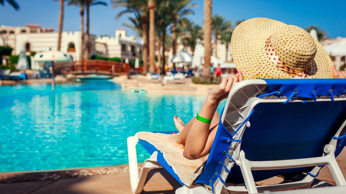 Woman relaxing by swimming pool lying on chaise-longue. Summer vacation. All inclusiveYoung woman relaxing by swimming pool lying on chaise-longue. Summer vacation. All inclusiveNedopekin Yuriypool, woman, happy, all inclusive, chaise-longue, hotel, swimming, vacation, summer, traveling, traveler, tourism, resort, travel, tourist, relaxing, caucasian, outdoors, together, female, holiday, portrait, romantic, active, enjoying, romance, leisure, hat, bikini, palm, sun, tropical, egypt, young, lying, sitting, resting, sunny, tan, spring, sexy, girl, lady, pool, woman, happy, all inclusive, chaise-longue, hotel, swimming, vacation, summer, traveling, traveler, tourism, resort, travel, tourist, relaxing, caucasian, outdoors, together, female, holiday, portrait, romantic, active, enjoying, romance, leisure, hat, bikini, palm, sun, tropical, egypt, young, lying, sitting, resting, sunny, tan, spring, sexy, girl, lady