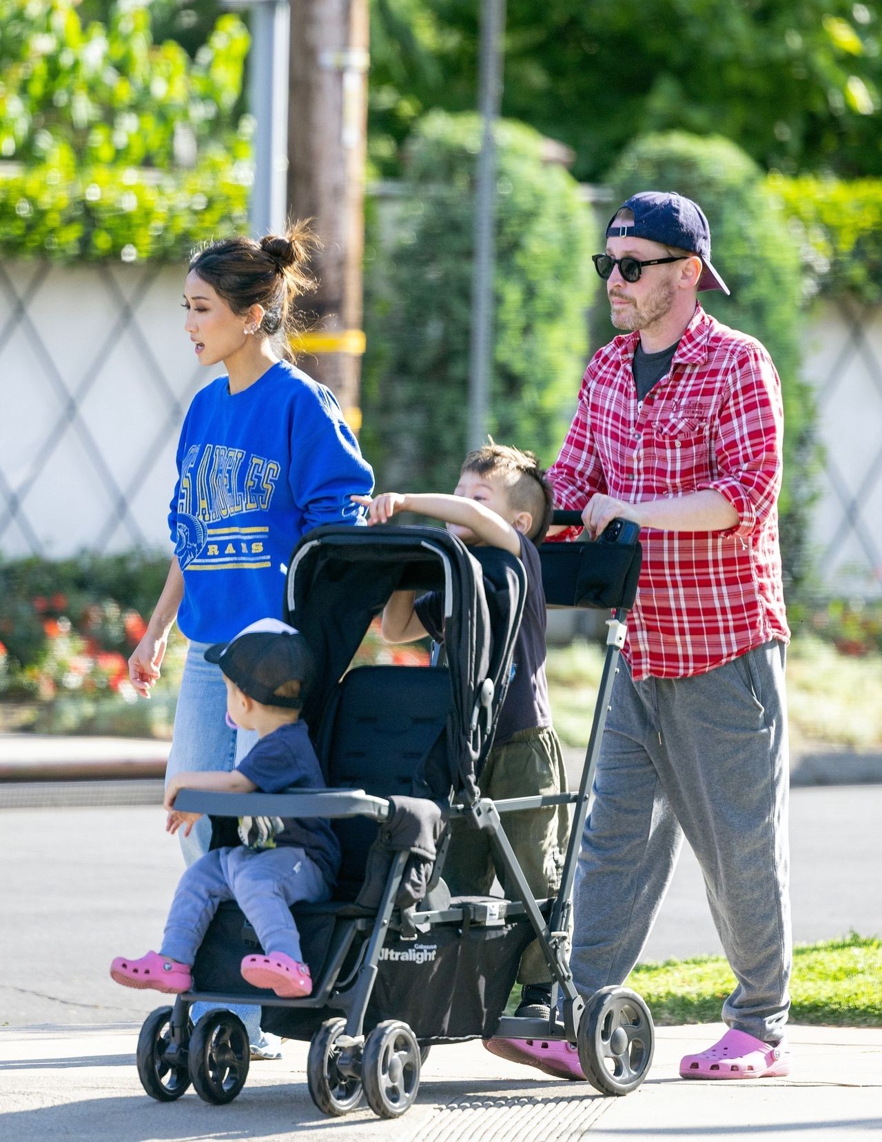 Macaulay Culkin on a family walk