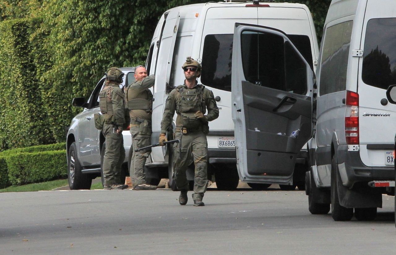 LOS ANGELES, CA - MARCH 25: View of law enforcement agents and vehicles outside Diddy's Beverly Hills estate are seen on March 25, 2024 in Los Angeles, California.  (Photo by HIGHFIVE/Bauer-Griffin/GC Images)