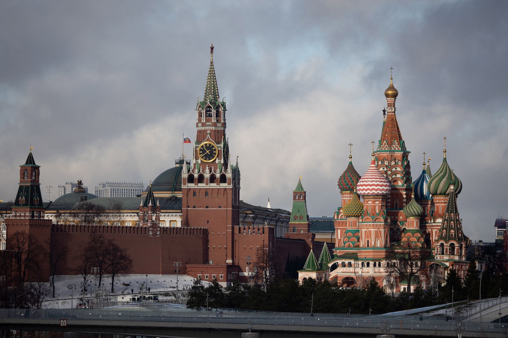 The Spasskaya tower of the Kremlin, center, and Saint Basil's Cathedral, right, in Moscow, Russia, on Tuesday, Feb. 22, 2022. The ruble tumbled the most since March 2020 after President Vladimir Putin recognized self-declared separatist republics in east Ukraine, deepening a standoff with the West. Photographer: Andrey Rudakov/Bloomberg via Getty Images