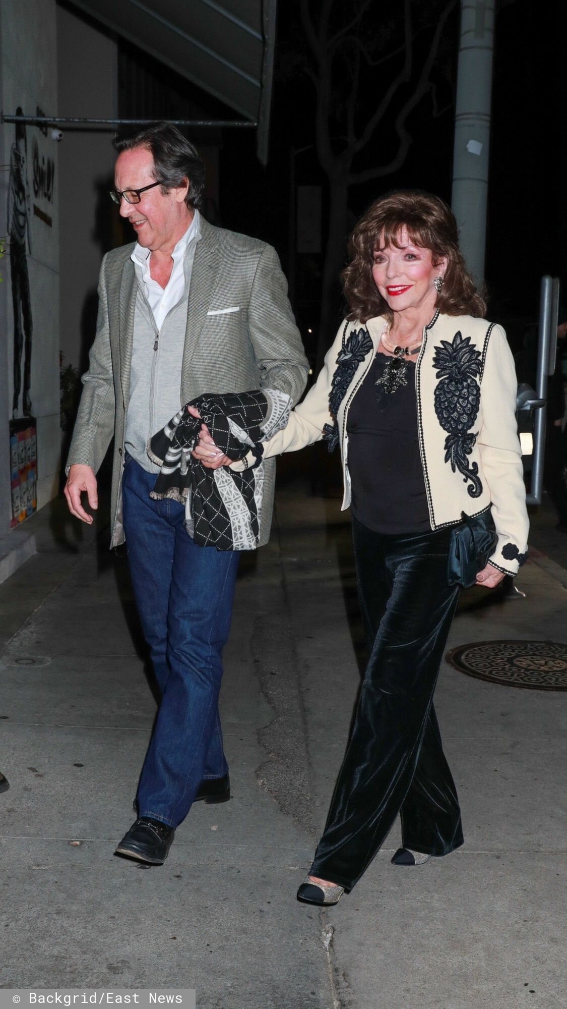 Joan Collins z mężem w drodze na kolację 