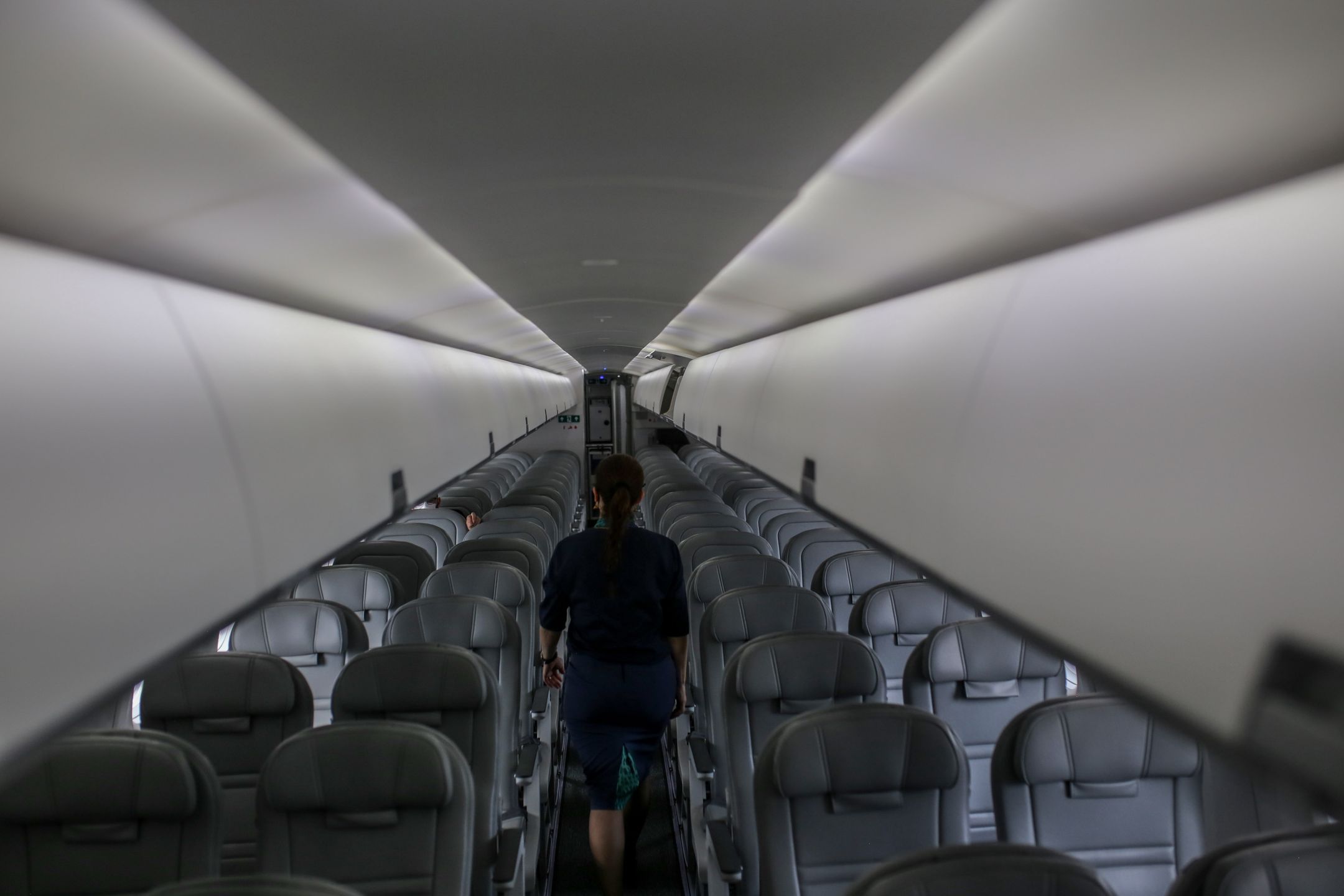 Seats in the interior of an Embraer E195-E2 aircraft at the Wings India 2022 Air Show held at Begumpet Airport in Hyderabad, India, on Thursday, March 24, 2022. The air show runs through March 27. Photographer: Dhiraj Singh/Bloomberg via Getty Images
