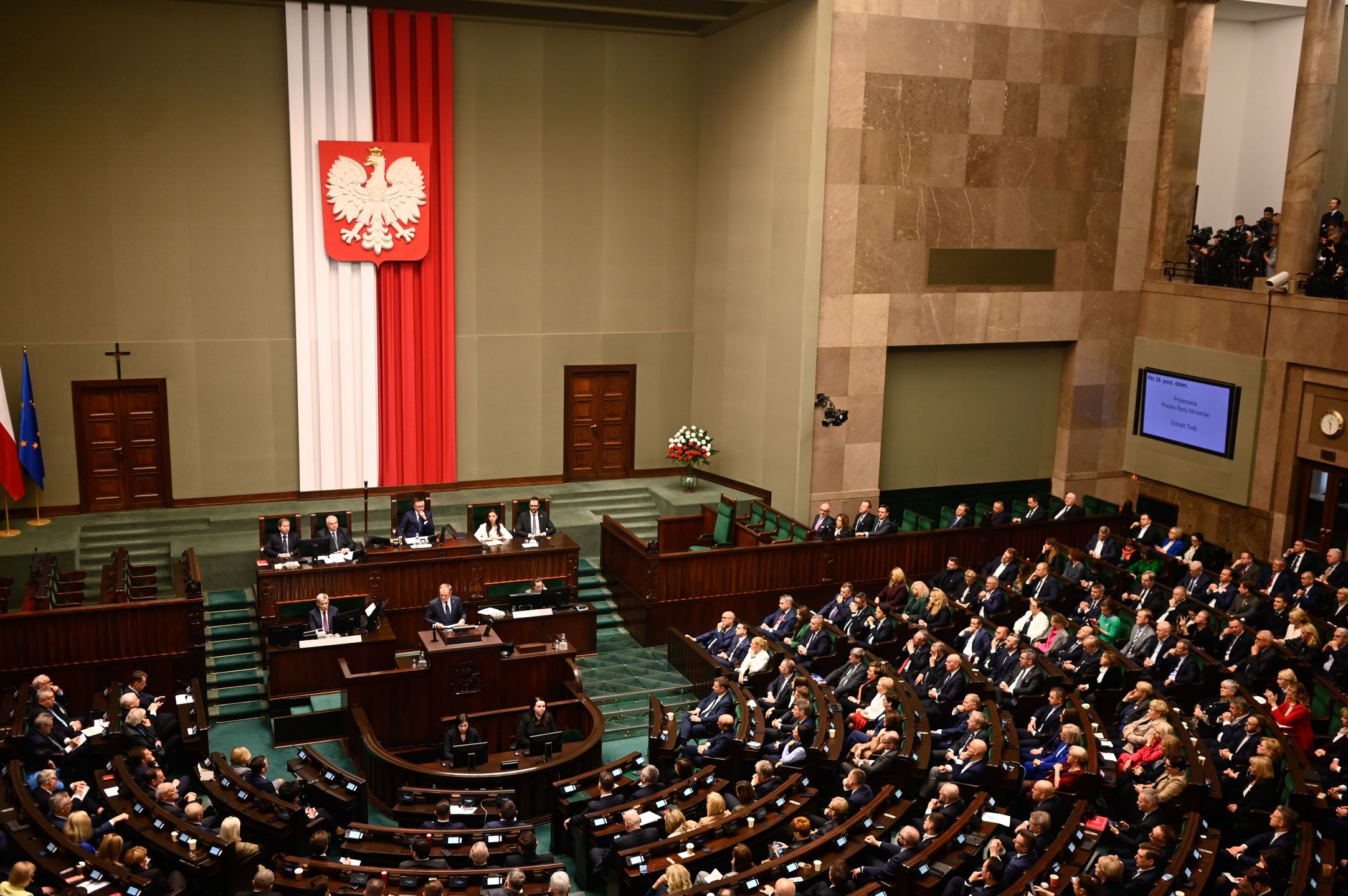 WARSAW, POLAND - DECEMBER 12: The leader of Civic Coalition (KO), Donald Tusk delivers a speech ahead of the vote of confidence on his government cabinet during a session at the parliament (SEJM) on December 12, 2023 in Warsaw, Poland. on December 12, 2023 in Warsaw, Poland. After eight years of Poland's national conservative party in power, centrist Donald Tusk is back and set to forge a pro-EU government. (Photo by Omar Marques/Getty Images)