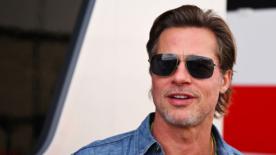 AUSTIN, TEXAS - OCTOBER 23: Brad Pitt walks in the Paddock prior to the F1 Grand Prix of USA at Circuit of The Americas on October 23, 2022 in Austin, Texas. (Photo by Clive Mason - Formula 1/Formula 1 via Getty Images)