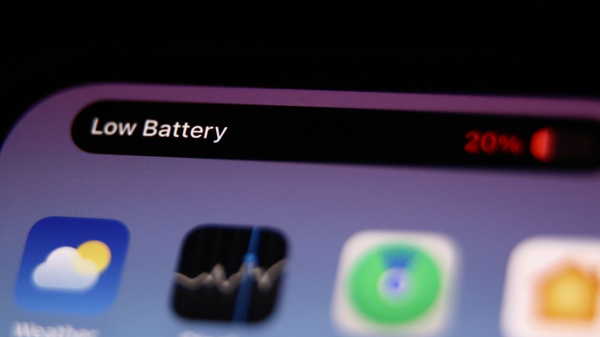 iPhone 15 Pro low battery notification is seen in this illustration photo taken in Krakow, Poland on November 22, 2023. (Photo by Jakub Porzycki/NurPhoto via Getty Images)