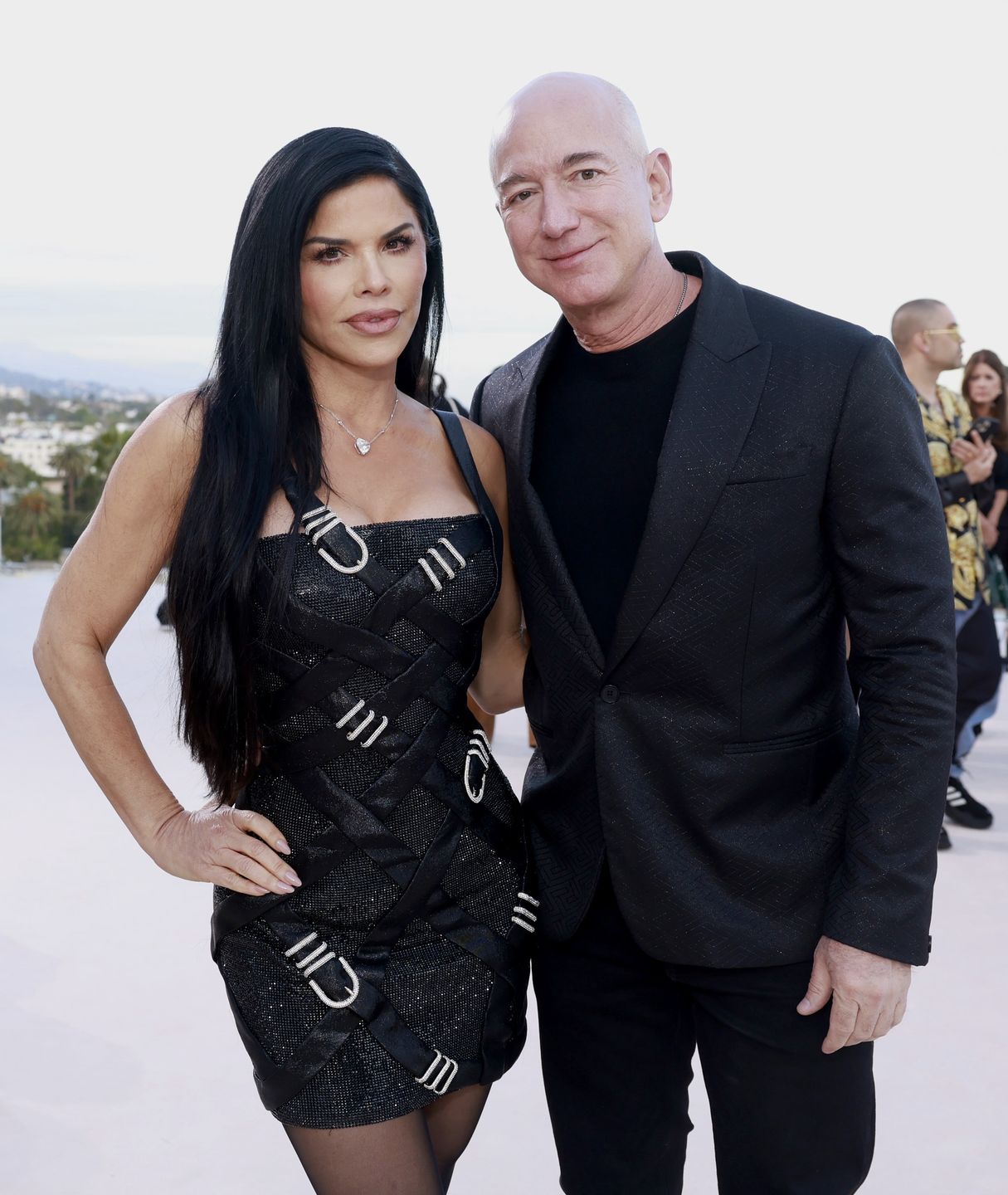 WEST HOLLYWOOD, CALIFORNIA - MARCH 09: (L-R) Lauren Sánchez and Jeff Bezos attend the Versace FW23 Show at Pacific Design Center on March 09, 2023 in West Hollywood, California. (Photo by Emma McIntyre/Getty Images)