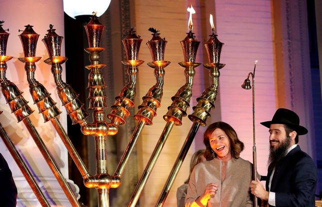 Riverside, CA -November 29: At right Riverside Mayor Patricia Lock Dawson and Rabbi Shmuel Fuss, Chabad Jewish Community Center smile after lighting The Grand Menorah during the 17th annual Chanukah Festival at Riverside Historic Courthouse in Riverside on Monday, November 29, 2021. (Photo by Terry Pierson/The Press-Enterprise via Getty Images)