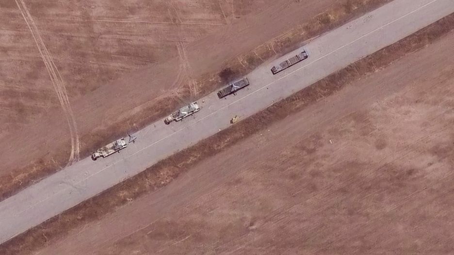 DEZFUL, IRAN -- JUNE 17, 2025: 12  Maxar Satellite Imagery shows Shahed-136 drones positioned on trailers and laid out on tarmac areas at Dezful Airbase. Location: 32.440, 48.388. Please use: Satellite image (c) 2025 Maxar Technologies.