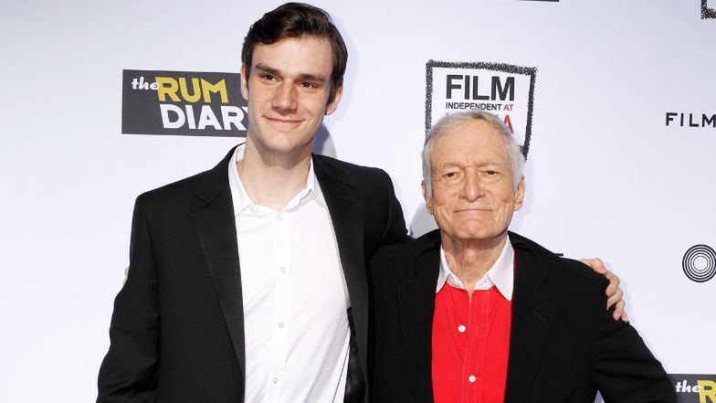 Hugh Hefner with his son